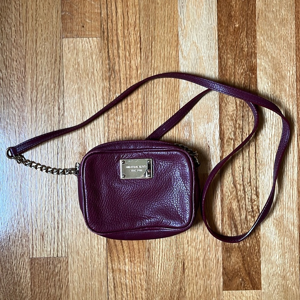 Michael Kors maroon crossbody with gold hardware